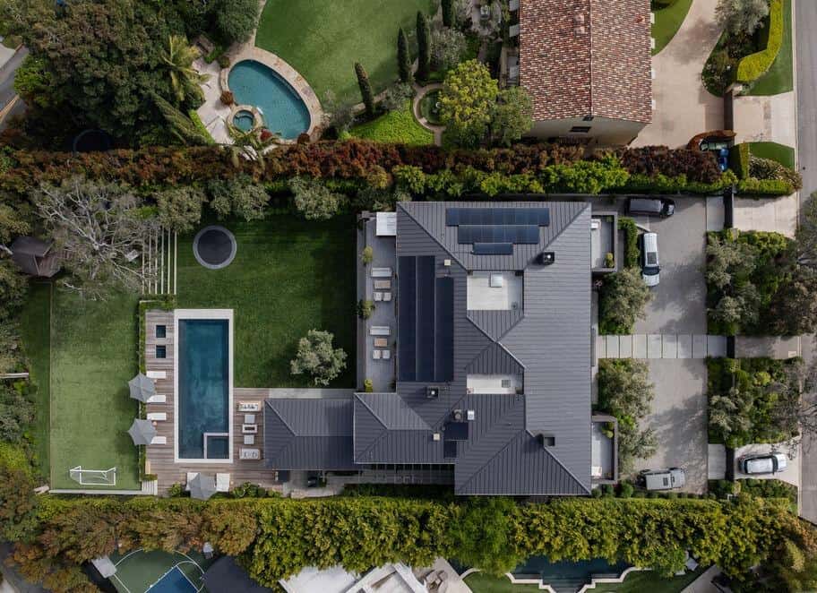 Luxury residential property with pool and landscaped yard.